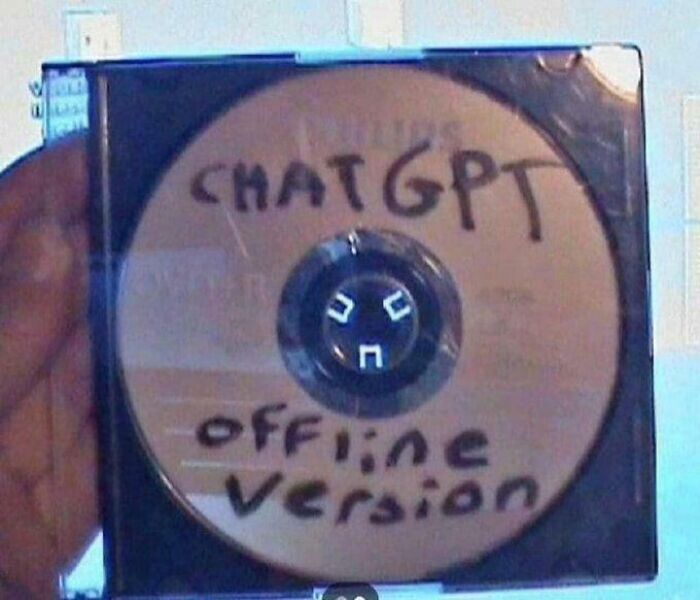A CD with ChatGPT Offline Version written on it in marker, highlighting online lies.