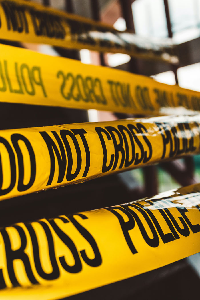 Police tape, signifying serious tenant stories and incidents for landlords.