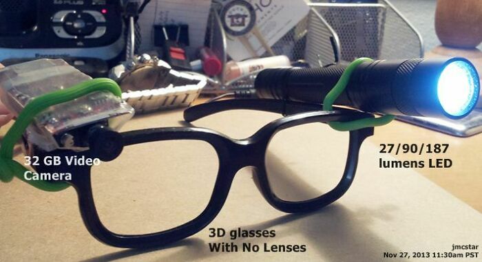 A DIY fail showing a pair of 3D glasses with a flashlight and video camera clumsily attached for a makeshift headcam.
