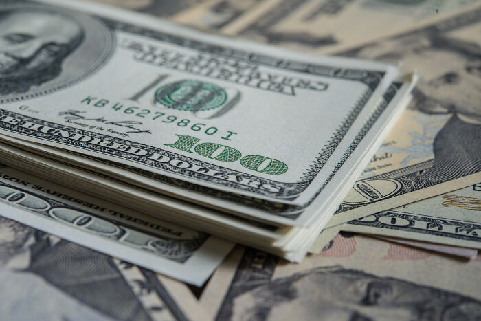 Stack of hundred dollar bills close-up