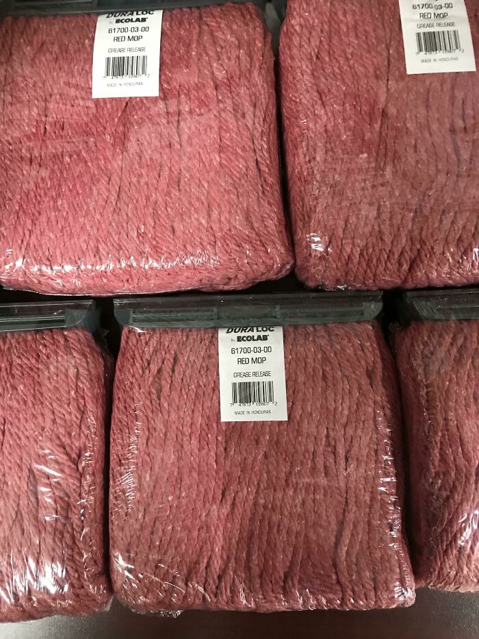Several packages of red mop heads, resembling ground meat, displayed as forbidden foods.