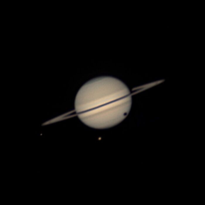 Backyard astrophotography of Saturn with visible rings and moons in Kentucky