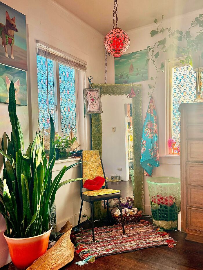 Cozy corner with plants, colorful rug, and eclectic quirky decor