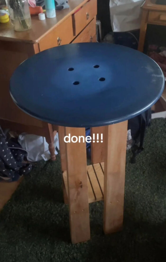 Wooden project stool with blue painted round top labeled done