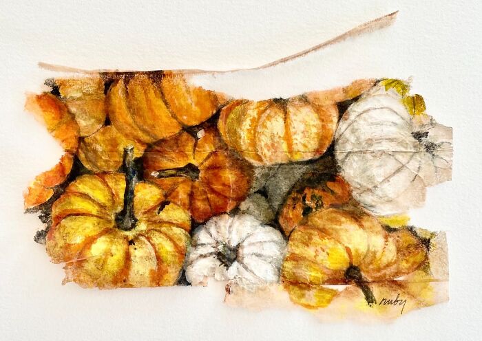 Miniature paintings of colorful pumpkins on a used tea bag by artist Ruby Silvious