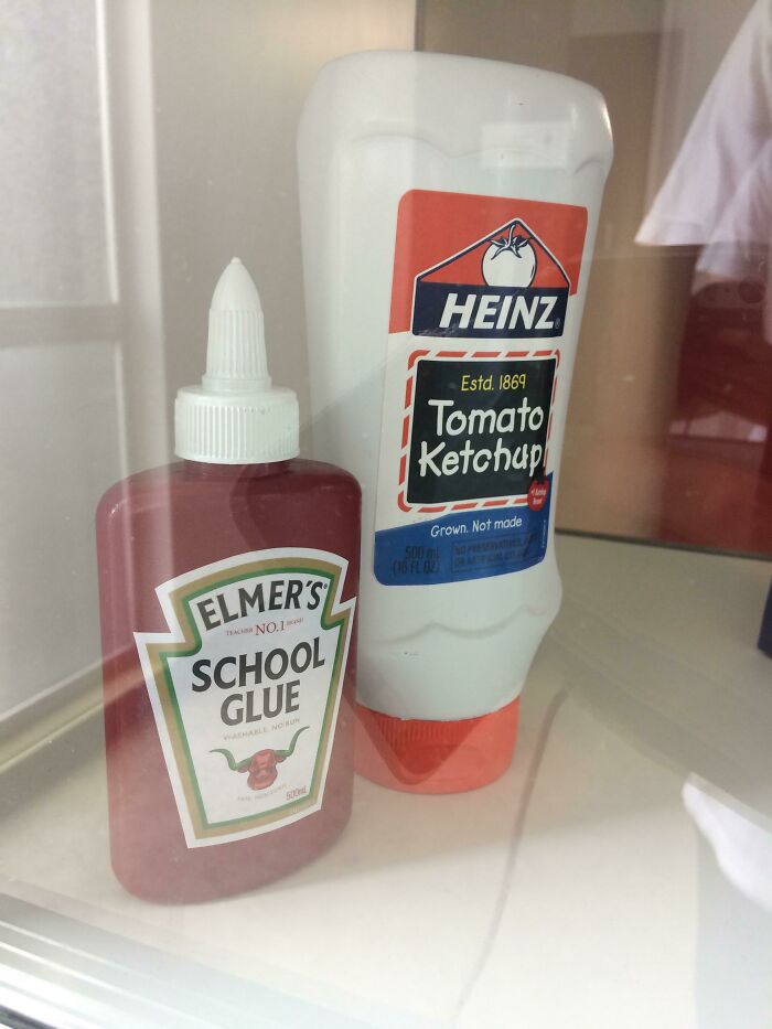 A bottle of Elmer's School Glue next to a bottle of Heinz Tomato Ketchup, both forbidden foods.