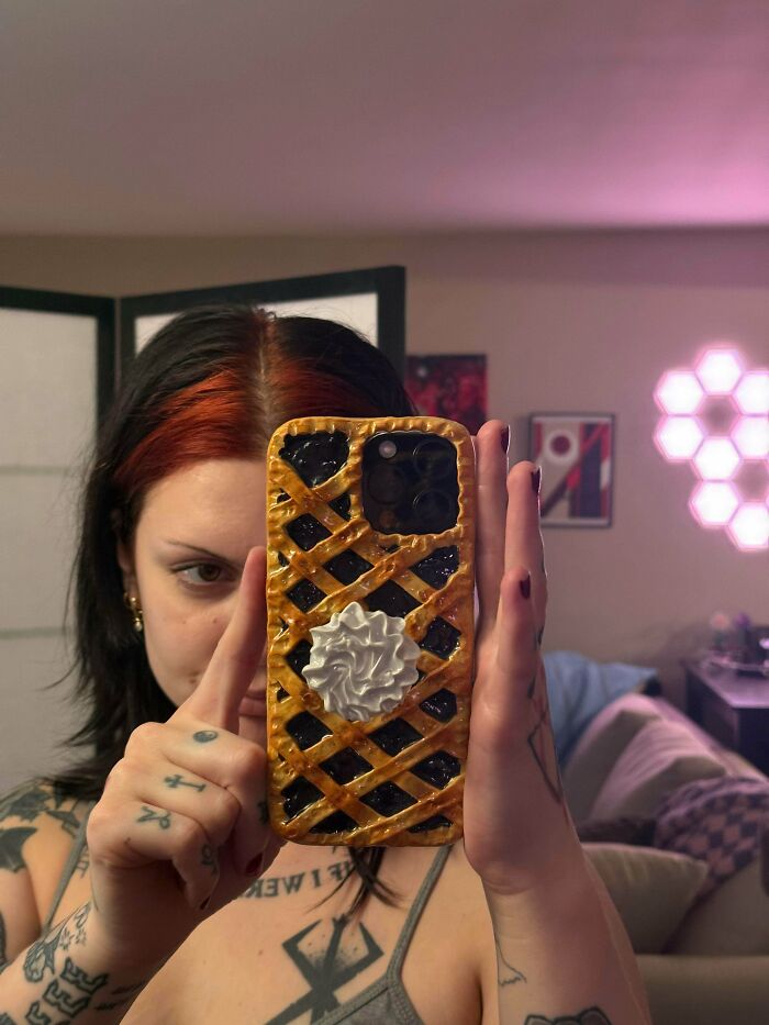 Phone case designed like a lattice topped pie with whipped cream