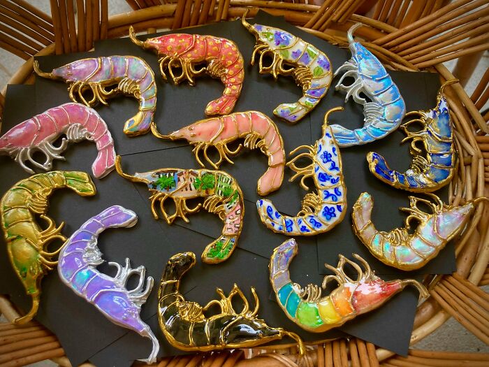 Handcrafted colorful shrimp brooches with gold details