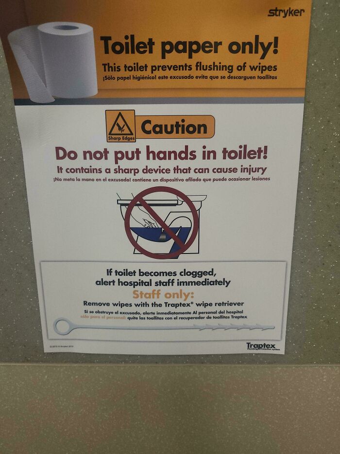 A truly bizarre sign warning against putting hands in the toilet, making people hallucinate its sharp edges.