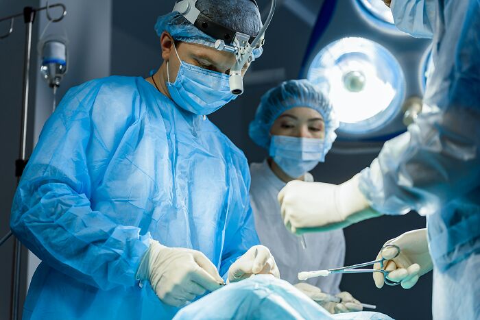Surgeons performing an operation, showcasing medical industry secrets and professional insights.