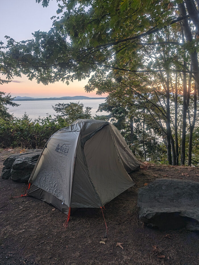 Tent set up near water at sunset on leukemia awareness walk