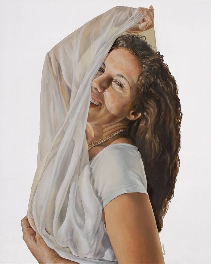 Paintings by Michel Devanakis showing a woman smiling behind a sheer white cloth veil.