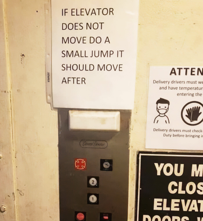 A truly bizarre sign on an elevator button panel suggests jumping if the elevator doesn't move.