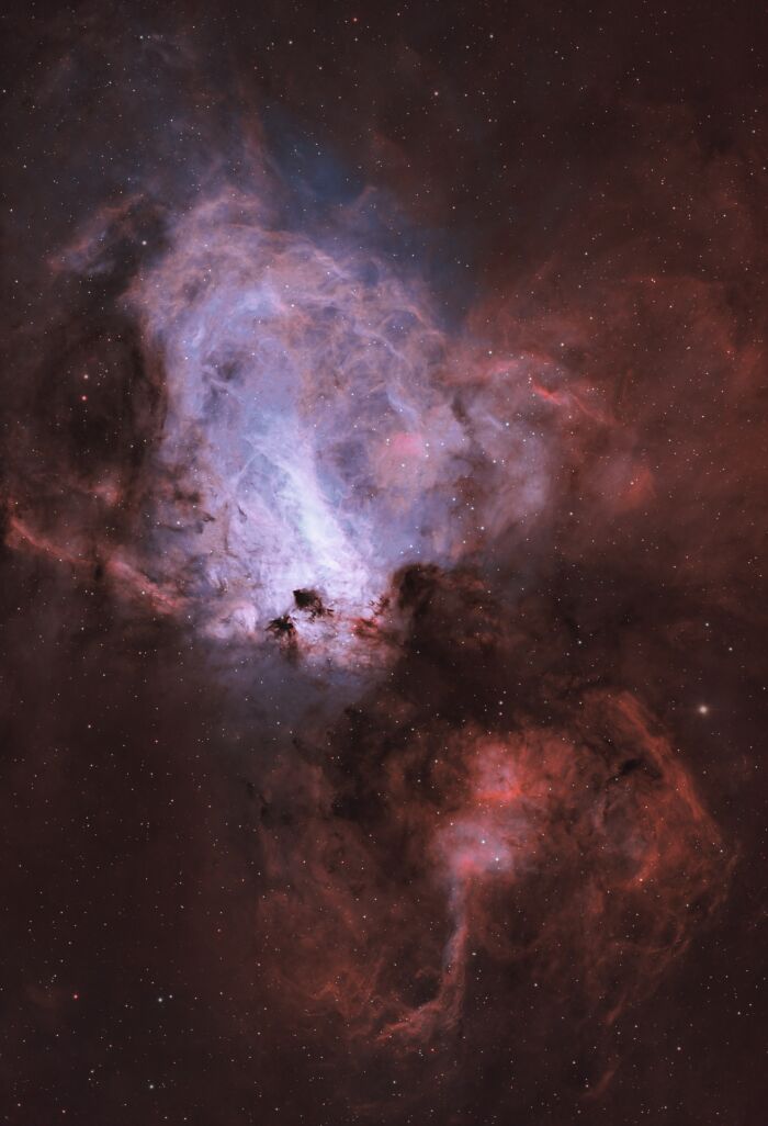 Kentucky backyard astrophotography showing a vibrant red and blue nebula cluster