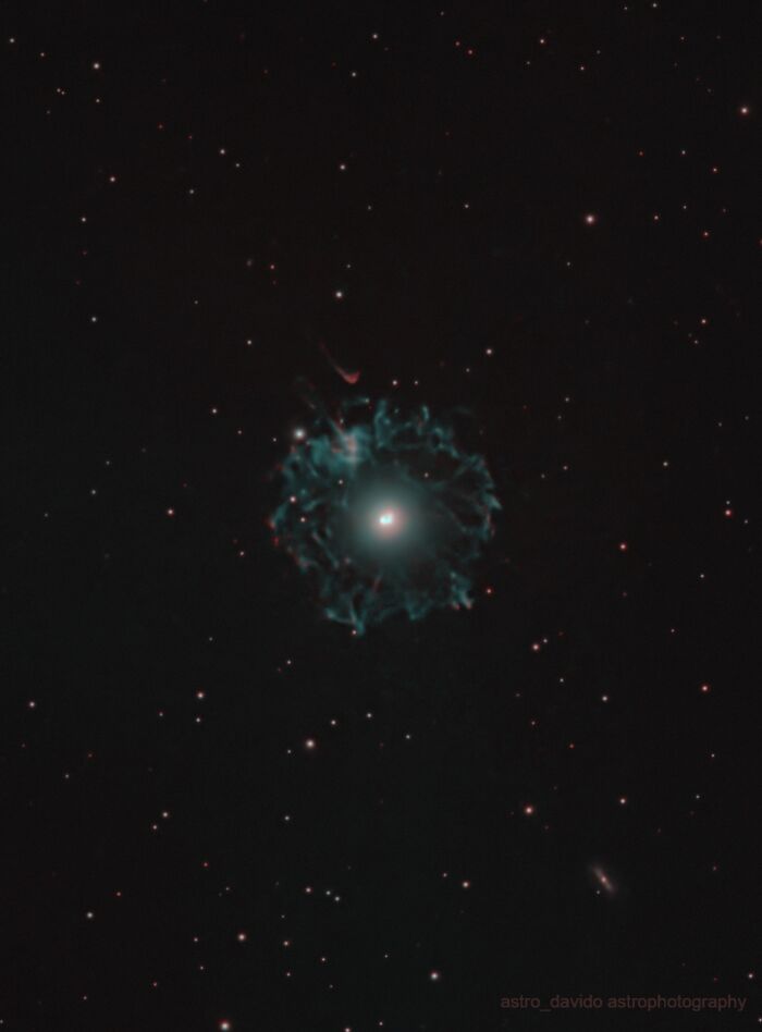 Astrophotos showing bright star surrounded by faint blue nebula and scattered stars