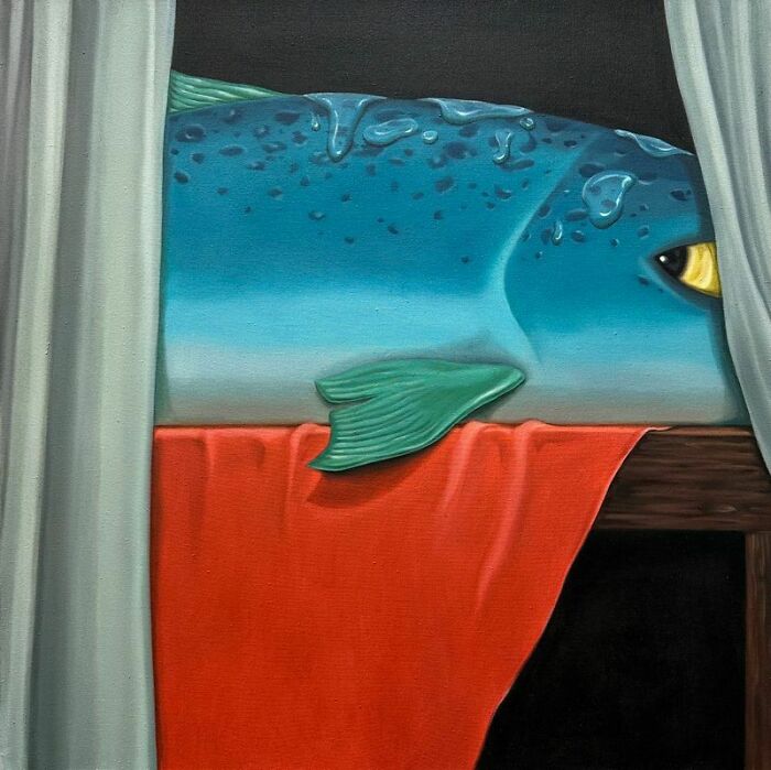 A large blue fish with a yellow eye peeks from behind curtains and a red cloth, creating a surreal moment.