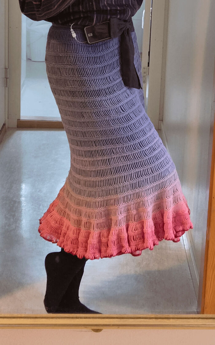 Crocheted gradient skirt with purple and pink hues and textured stitch pattern