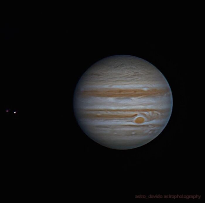 Detailed backyard astrophotography of planet Jupiter with visible cloud bands