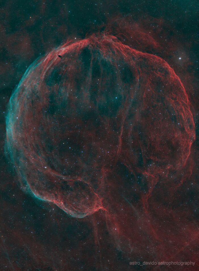 Vibrant red and blue backyard astrophotography of a large space nebula