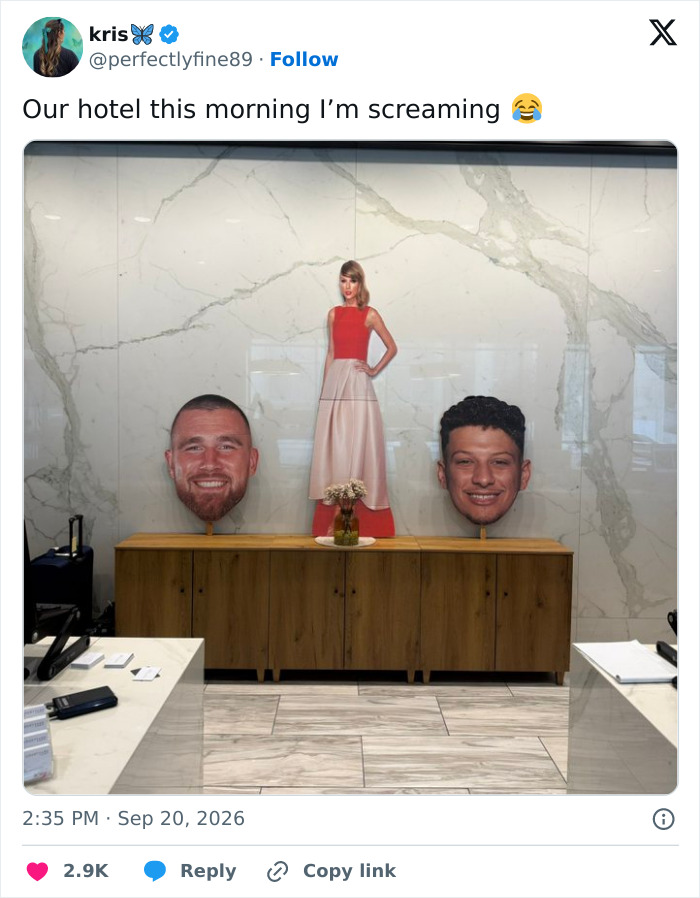 Hotel decorations showing a cutout of Taylor Swift between giant cutouts of Travis Kelce and Patrick Mahomes heads.