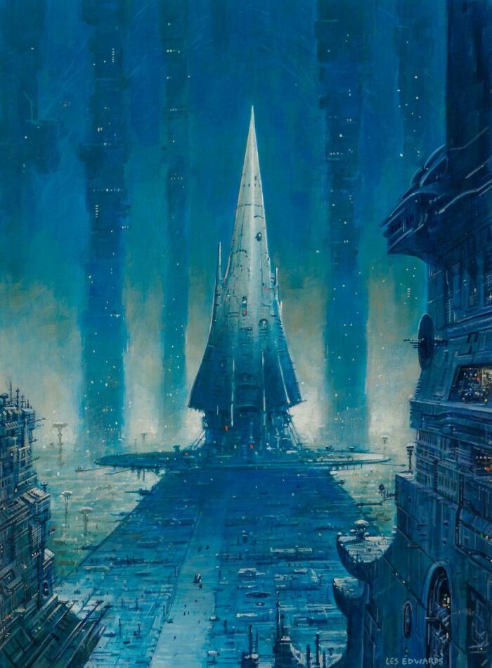 Retrofuturistic image of a towering, spired building in a futuristic city, bathed in blue light.
