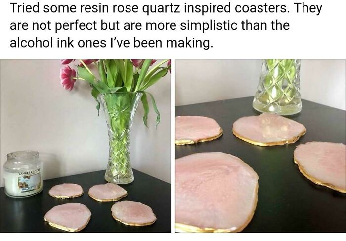 A collection of resin rose quartz inspired coasters on a dark table, near a vase of tulips, among forbidden foods.