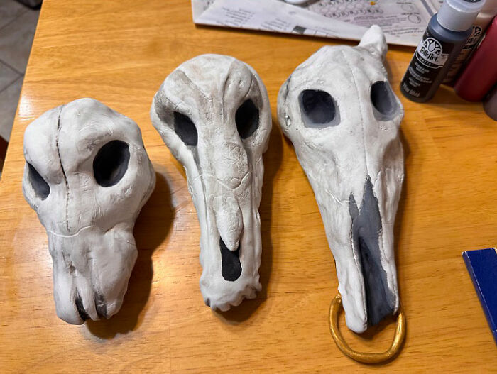 Three painted clay animal skulls created for a Mad Max Furry Road photoshoot.