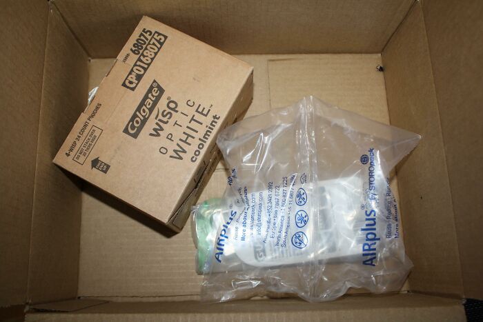 Small product inside a large shipping box showing wasteful packaging fails