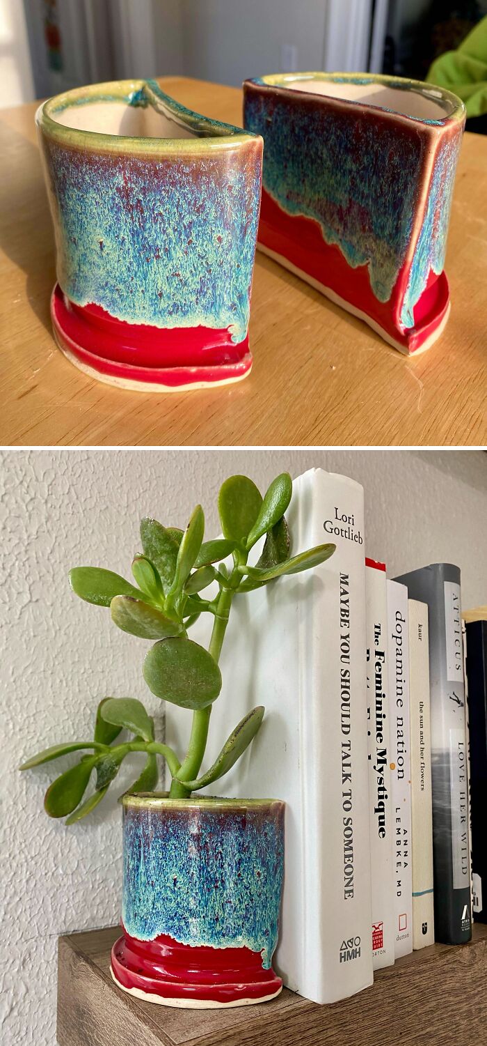 Split pottery planter used as a bookend next to books