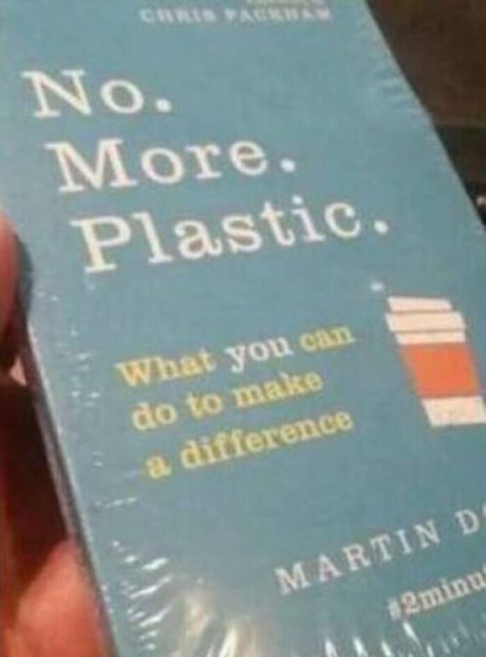 Book titled No More Plastic wrapped in plastic film as an ironic bad packaging fail.