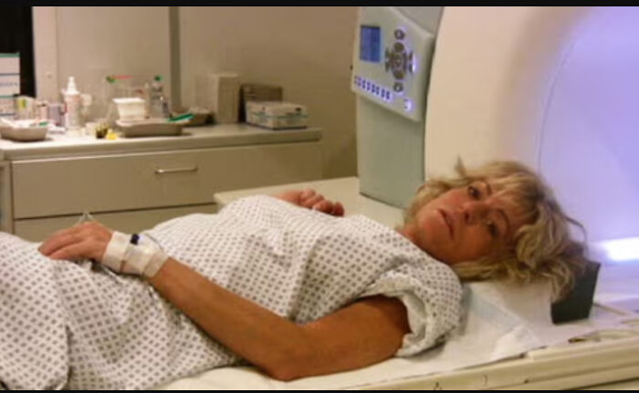 Woman lying on a hospital scanner bed captured in photos for the last time