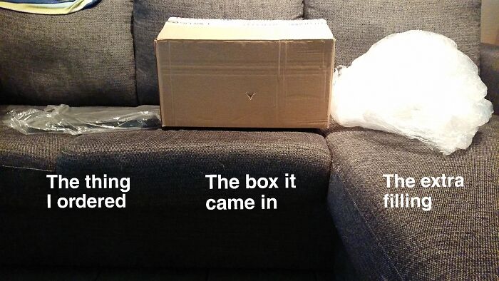 Small ordered item next to a large box and extra filling showing bad packaging fails.