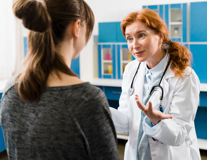 A doctor explaining a situation to a patient, discussing real reasons marriages collapsed