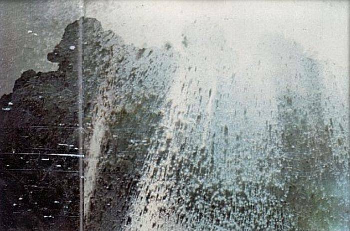 Volcanic eruption spraying ash and debris, captured in photos for the last time.