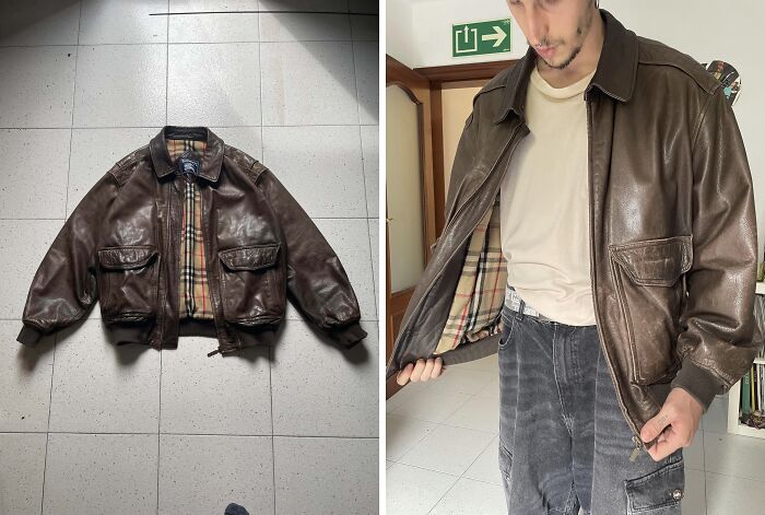 A brown leather bomber jacket on a floor and worn by a person, one of many great thrift store finds