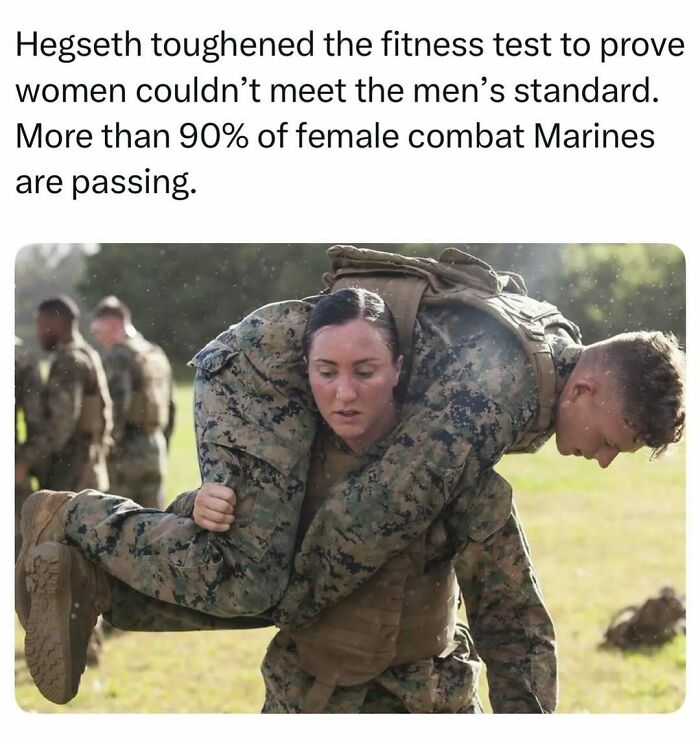 A female combat Marine carries another soldier, showing random finds and inspiring tales