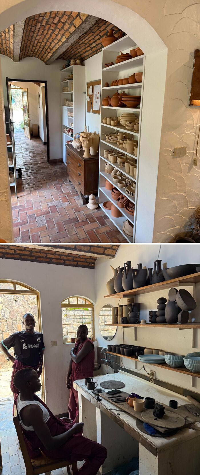 Shelves full of handcrafted ceramics and artisans working in a pottery creations studio.