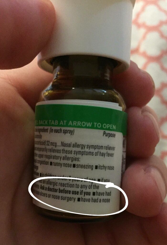 A nasal spray bottle warning label showing cut-off text, highlighting funny packaging fails.