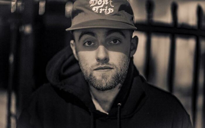 A black-and-white portrait of Mac Miller captured in photos for the last time.