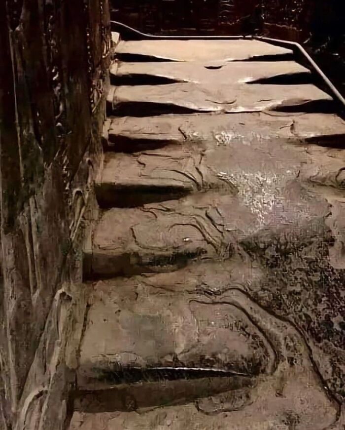 Ancient worn stone stairs, showcasing interesting facts about the past and ancient architecture.