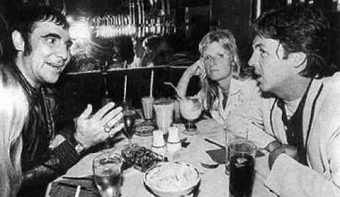 Keith Moon and Paul McCartney chatting, captured in photos for the last time.