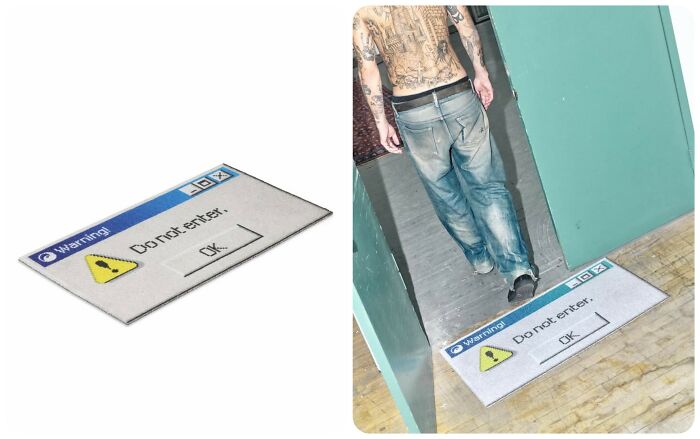 A retro warning pop-up doormat representing early internet nostalgia at an entrance.