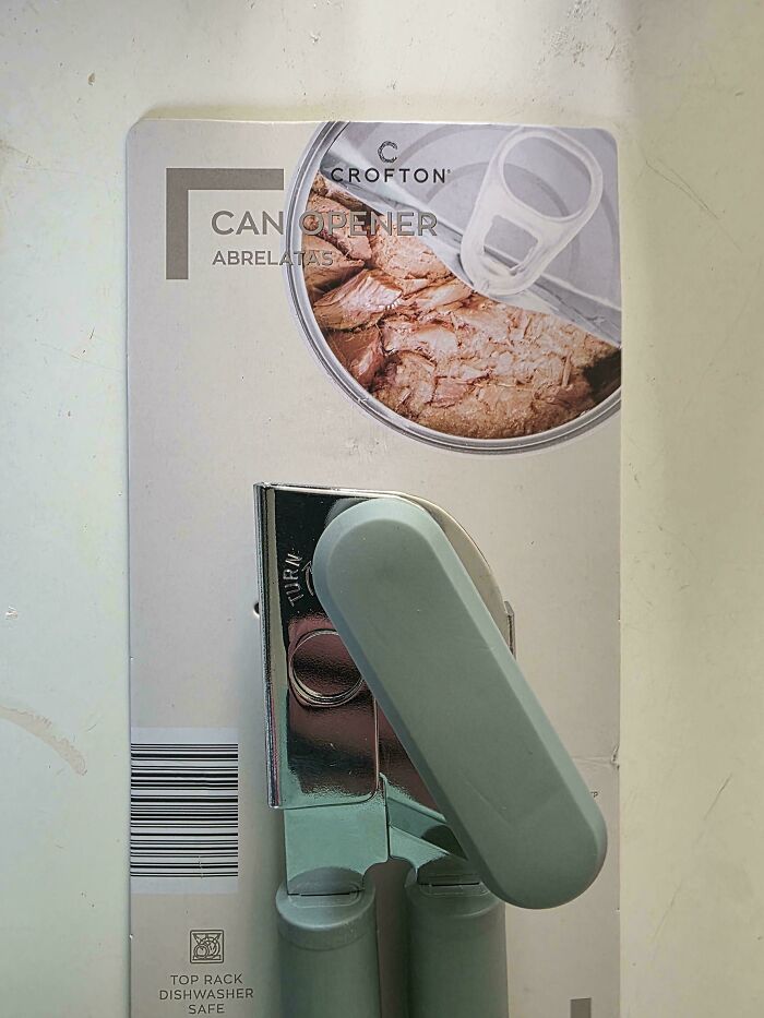 A can opener in packaging featuring an image of an easy-open pull-tab can, showing a packaging fail.