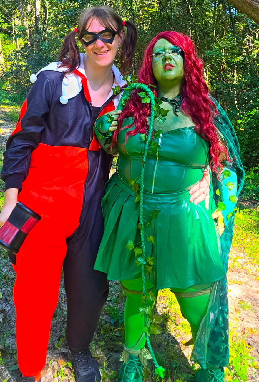 Two friends dressed up as Harley Quinn and Poison Ivy as a creative Halloween costume idea.