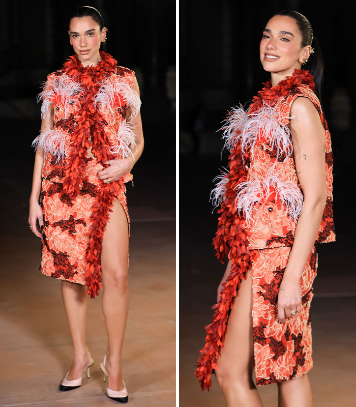 Dua Lipa wearing an orange textured dress at the 2026 Paris Fashion Week.