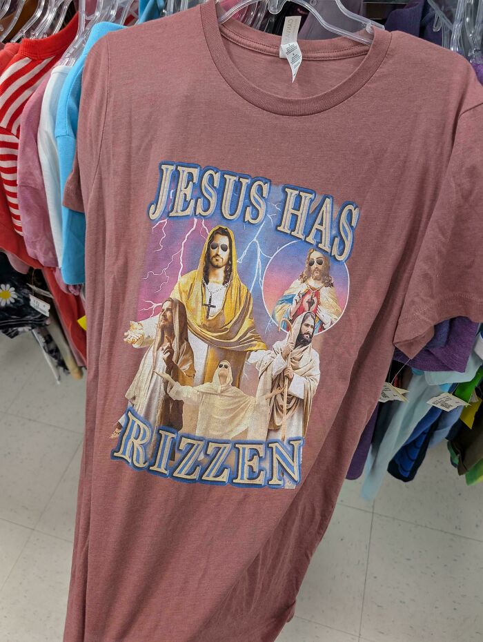 A funny Jesus Has Rizzen t-shirt found among thrift store finds.