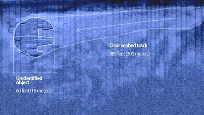 Sonar scan depicting a mysterious object discovered at the bottom of the ocean floor