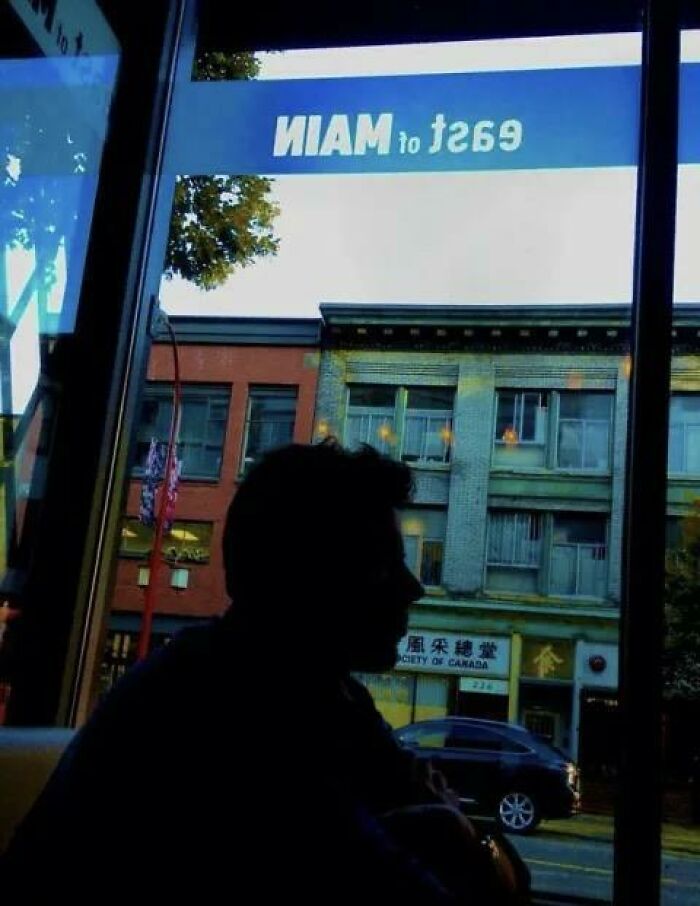 Silhouette of a person in a cafe captured in photos for the last time.